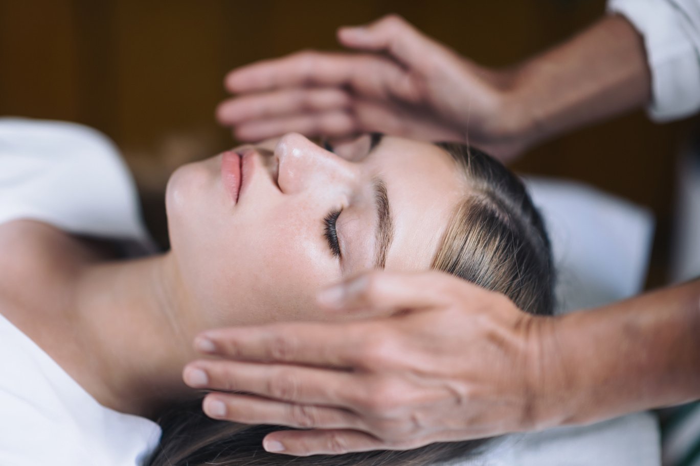 Reiki Healing Treatment With Teenage Girl